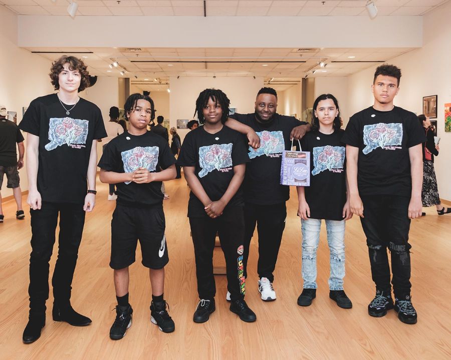 Student artists and their mentor, Tyese Williams
