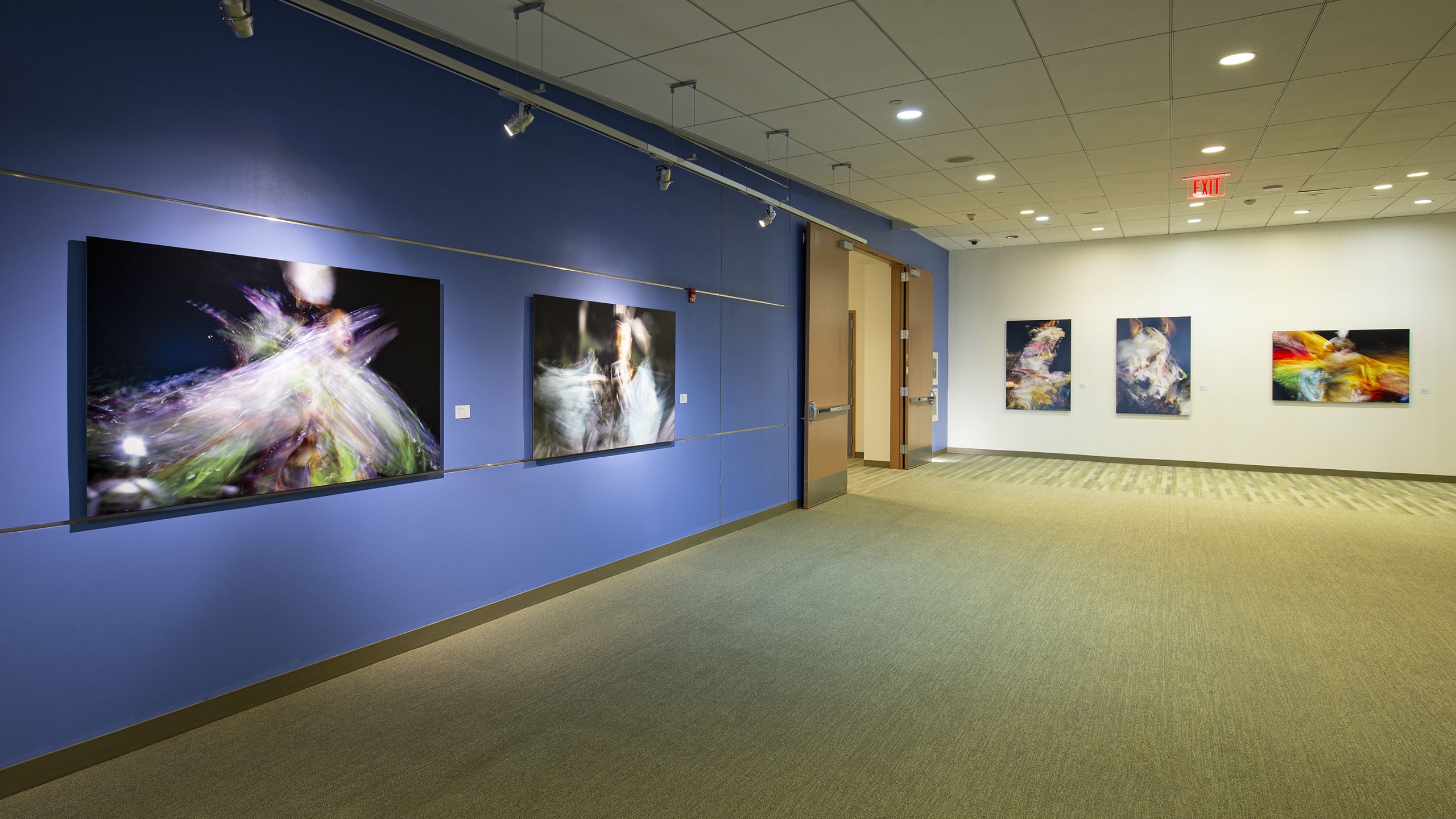 Installation photo of Kim Weston's exhibition, "Sweet Grass: Dancing with My Ancestors"